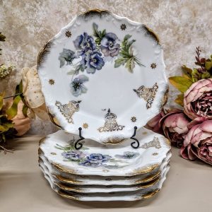 Koogitaldrikud kannikeseõite dekooriga - (1915–1938)